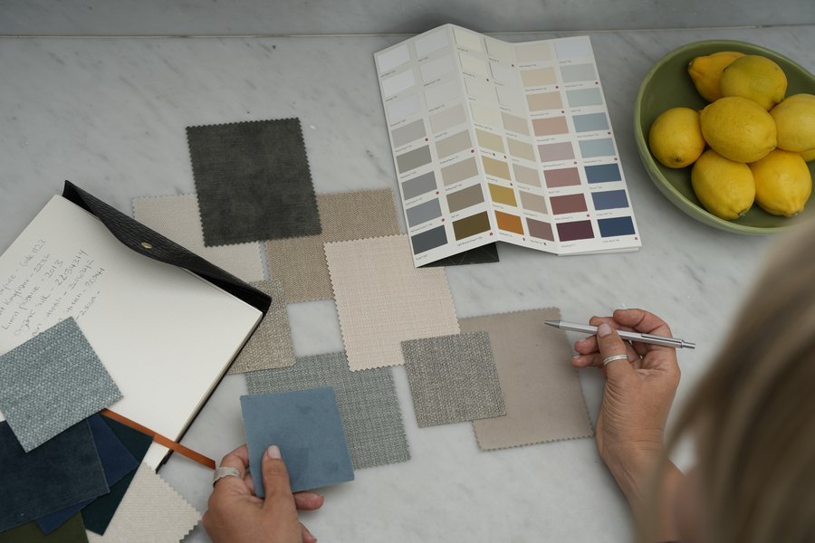 Fabric and colour swatches reviewed during a home styling and decluttering action plan