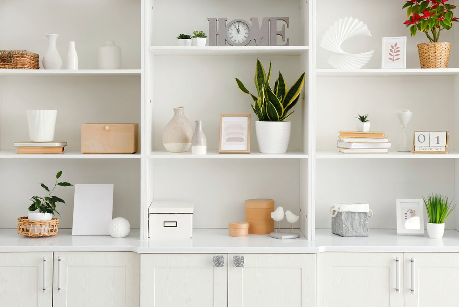 Styled shelving with vases and books, home organising consultation